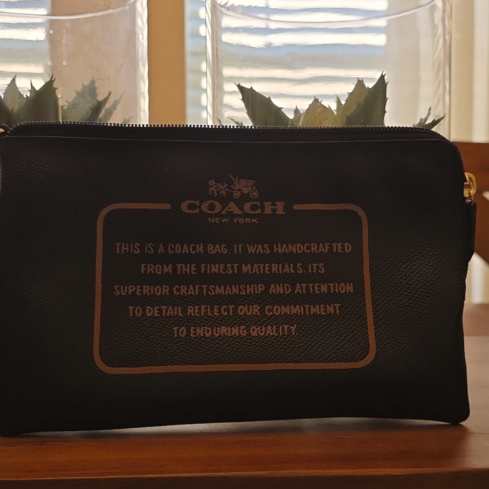 Coach black saffiano leather wristlet